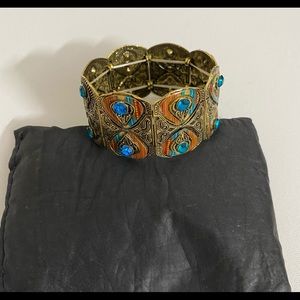 Bracelets,with blue stone,flexible,motifs! Gorgeous bracelet!!